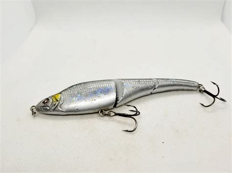 The Battle of the Lures: Comparing the Sebile Magic Swimmer 125 Polished to the Competition